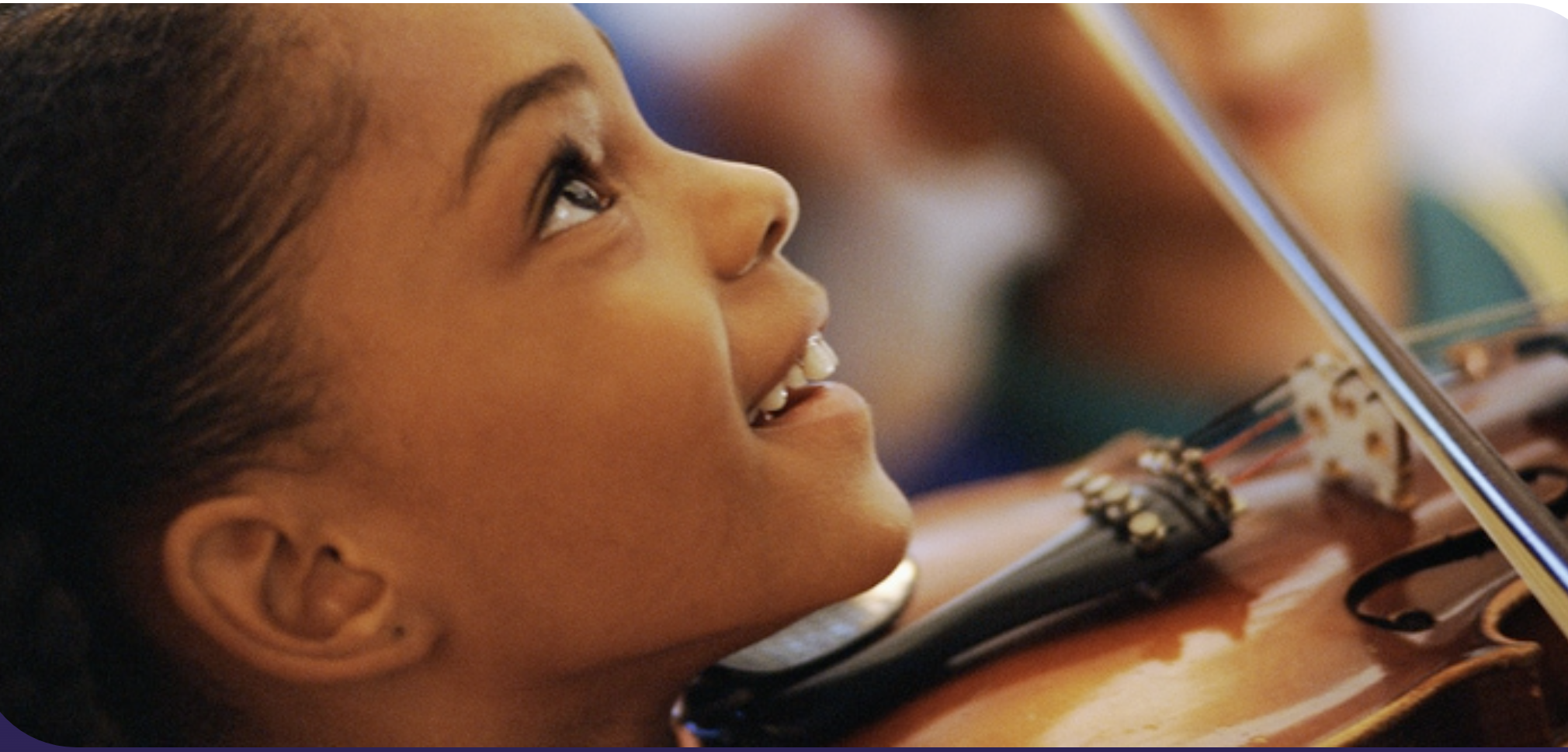 Young student playing violin